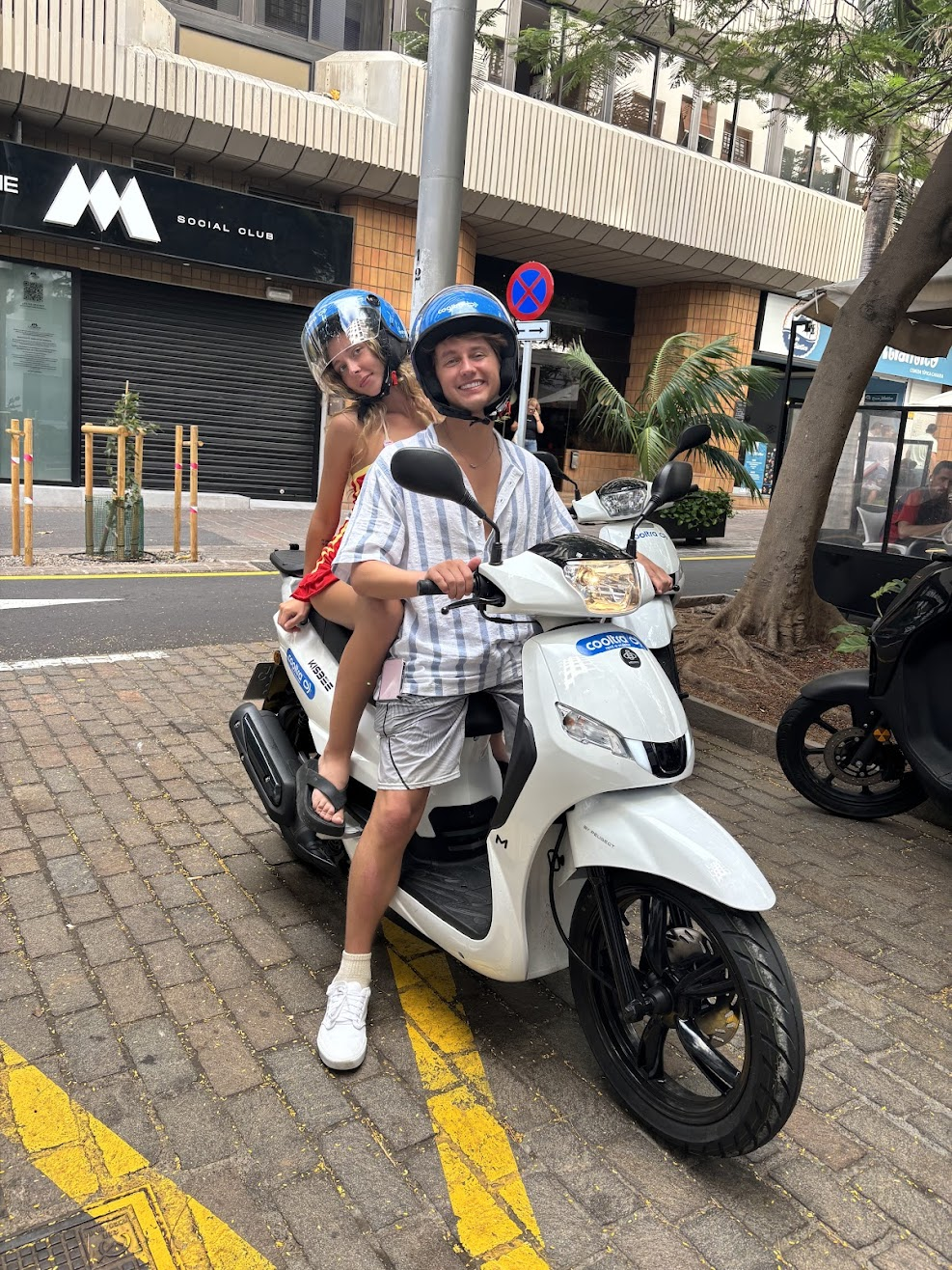 Nicholas and Genna on a scooter in Portugal